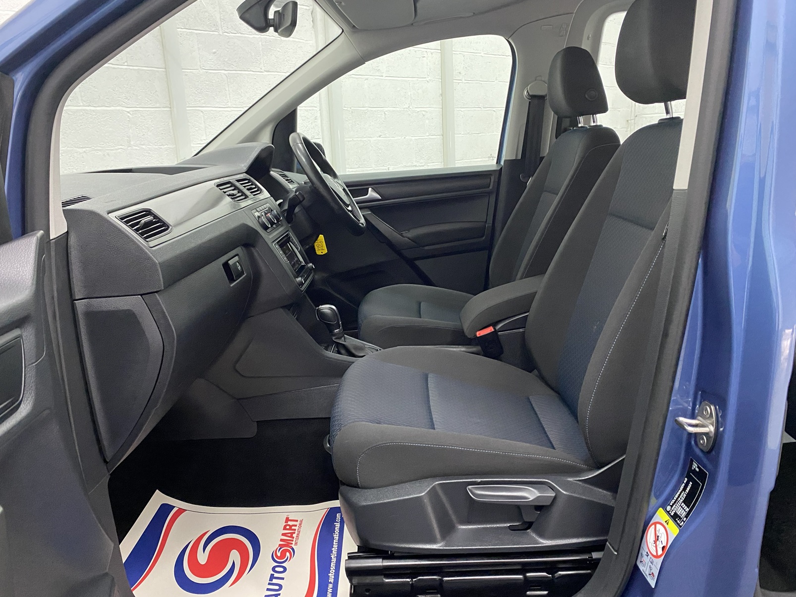 Volkswagen Caddy Life Petrol Automatic Wheelchair Accessible Vehicle that is For sale at Michael Harraway Cars in Weston super Mare. HD18 FD 18