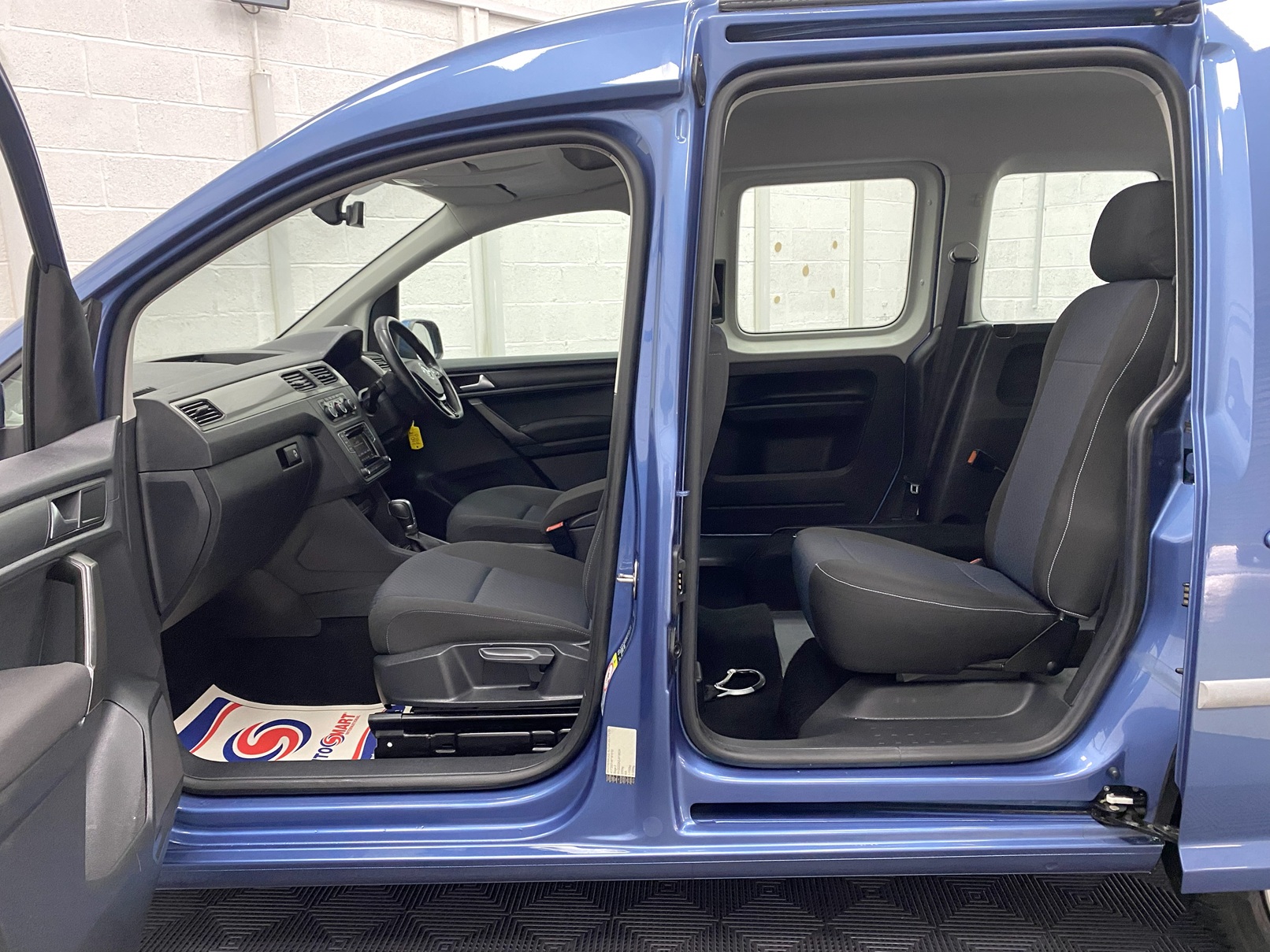 Volkswagen Caddy Life Petrol Automatic Wheelchair Accessible Vehicle that is For sale at Michael Harraway Cars in Weston super Mare. HD18 FD 20