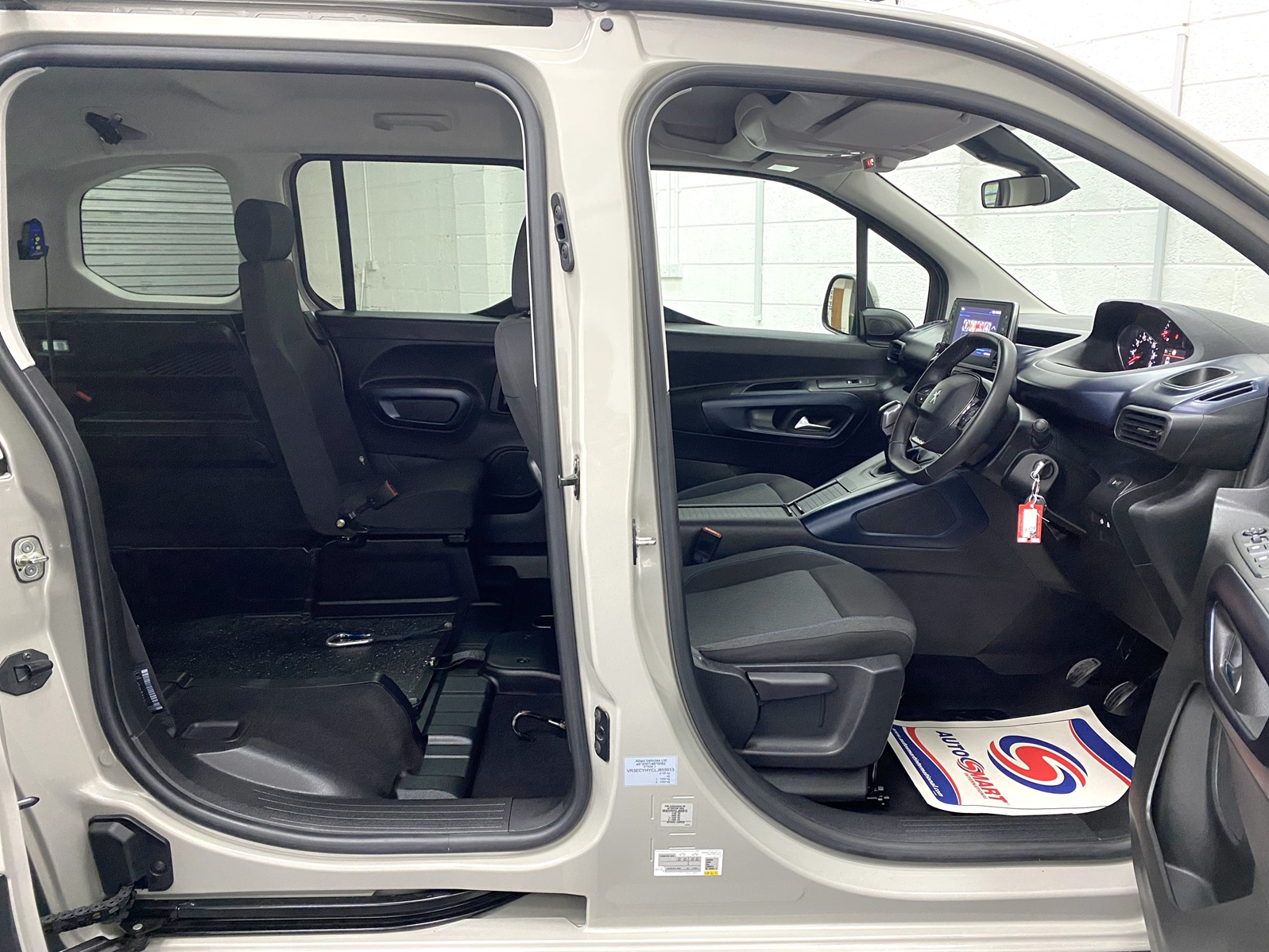 2020 Beige Peugeot Rifter Disabled accessible vehicle interior showing front seats and single rear seat SF70 KNX