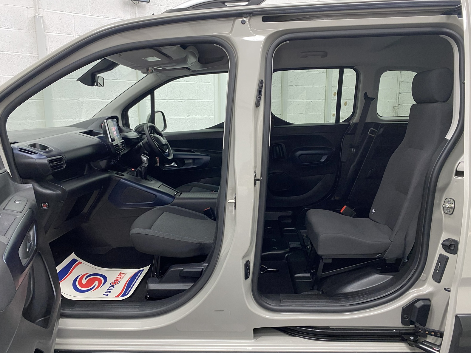 2020 Peugeot Rifter WAV interior view from the passenger side showing front and rear seats SF70 KNX