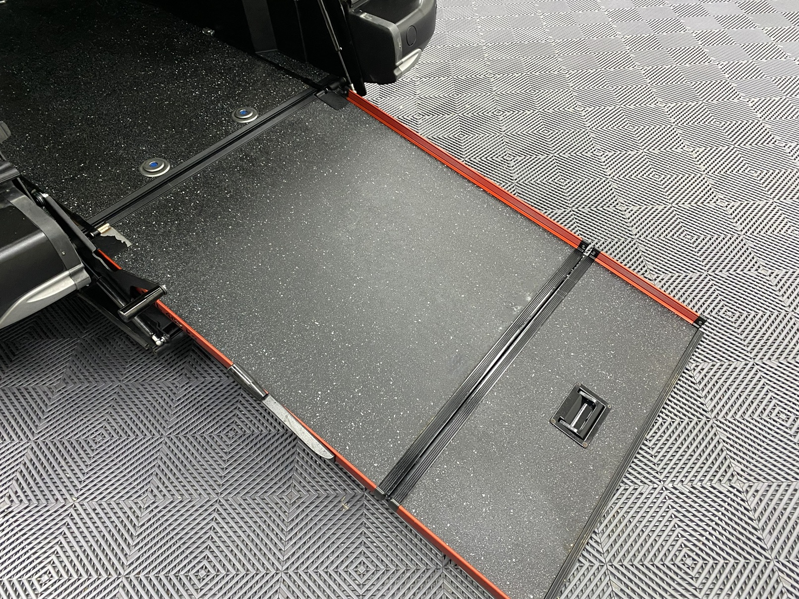 Rear wheelchair ramp in the deployed position on a Peugeot Rifter Disabled accessible vehicle SF70 KNX