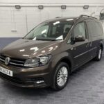2021 Volkswagen Caddy Maxi in metallic bronze front three quarter of near side NK21 CCA