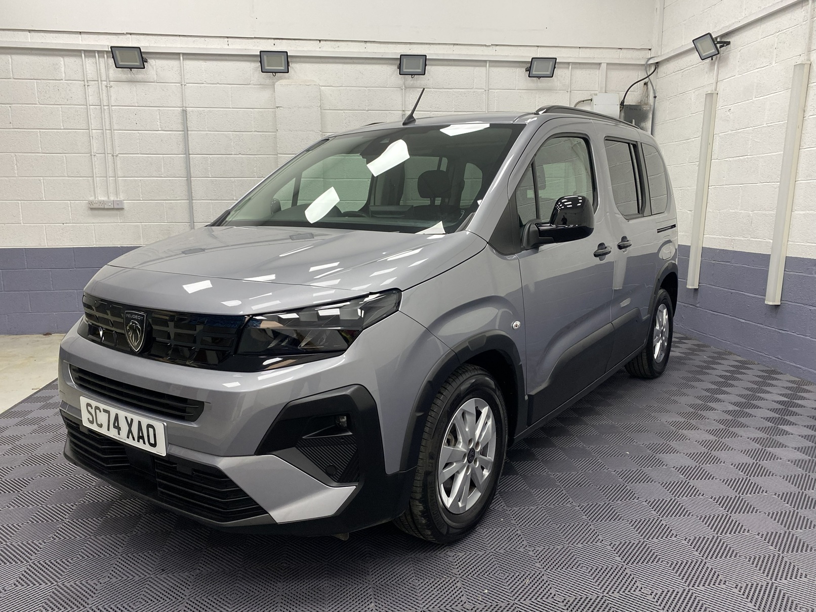 2025 light grey Peugeot Rifter front three quarter SC74 XAO