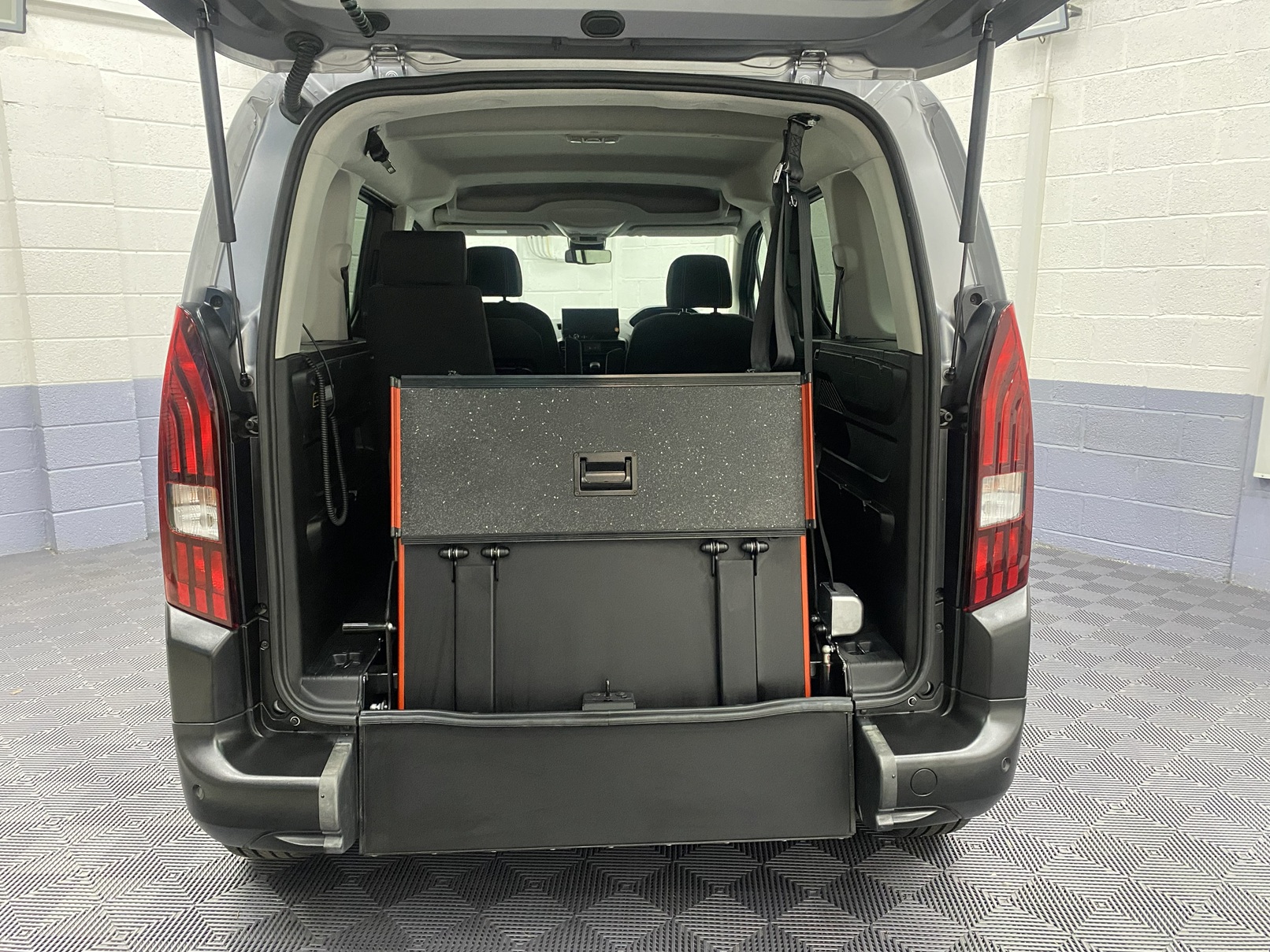 2025 wheelchair accessible Peugeot Rifter with the rear ramp in the upright position SC74 XAO