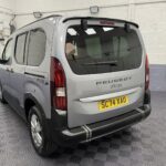 2025 grey Peugeot Rifter rear three quarter view zoomed SC74 XAO