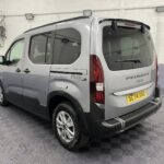 2025 grey Peugeot Rifter rear three quarter view SC74 XAO
