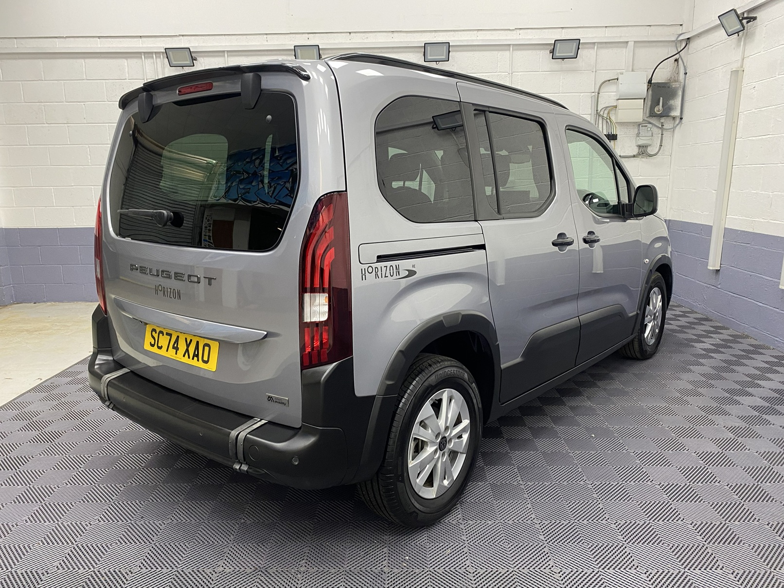 2025 Peugeot Rifter rear three quarter view from the offside SC74 XAO