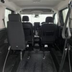 2025 Peugeot Rifter interior view of wheelchair space and single rear passenger seat SC74 XAO