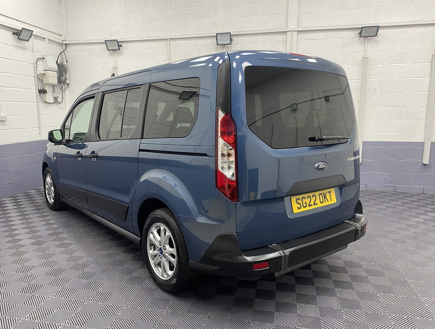 Blue Ford Grand Tourneo Connect Rear three quarter view SG22 OKT