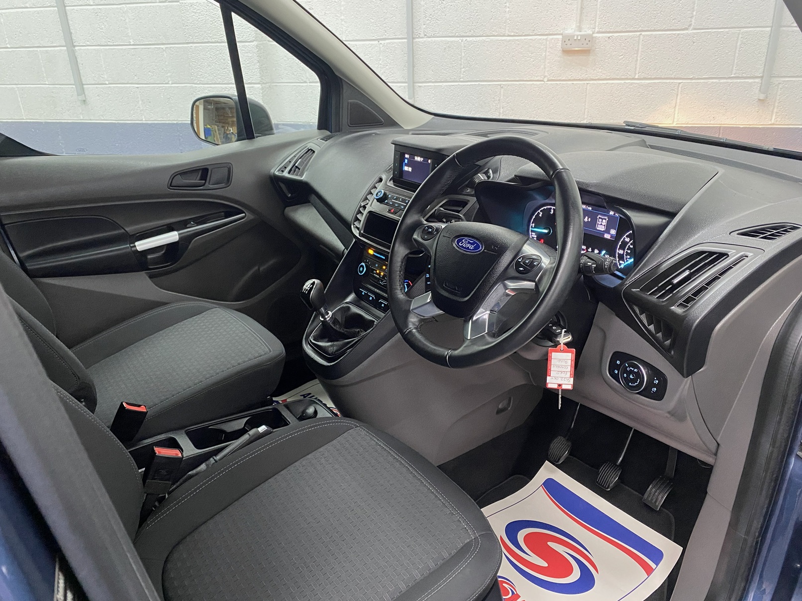 Steering wheel and drivers side dsahboard on a 2022 Ford Grand Tourneo Connect SG22 OKT