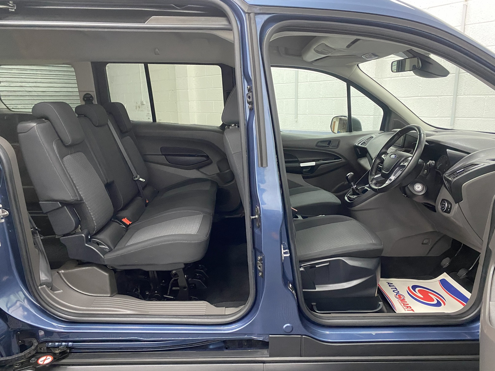 Interior side view of a 2022 Ford Grand Tourneo Connect Zetec SG22 OKT