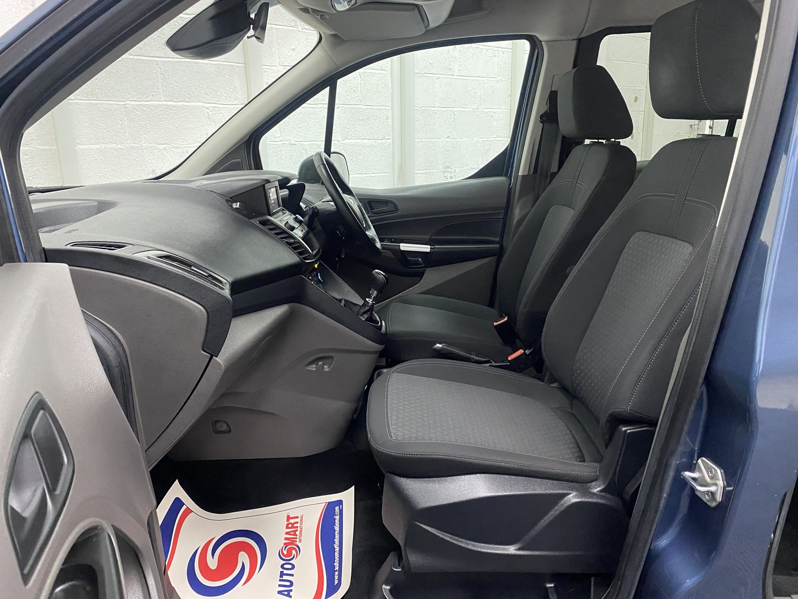 Front seat from passenger side of 2022 Ford Grand Tourneo Zetec SG22 OKT