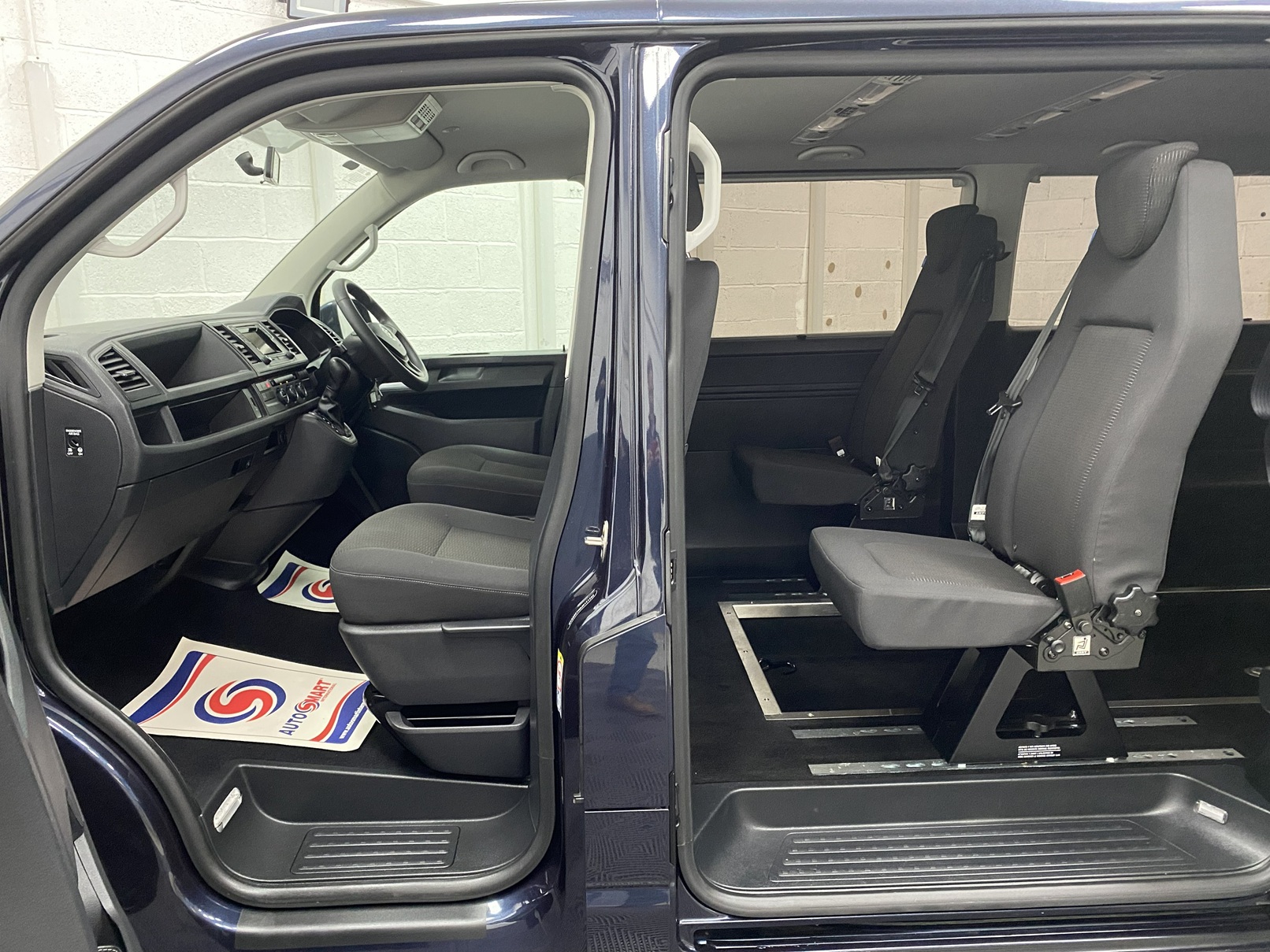 interior view of both front and rear seats in 2018 Volkswagen Transporter T6 WAV YJ68 BMU