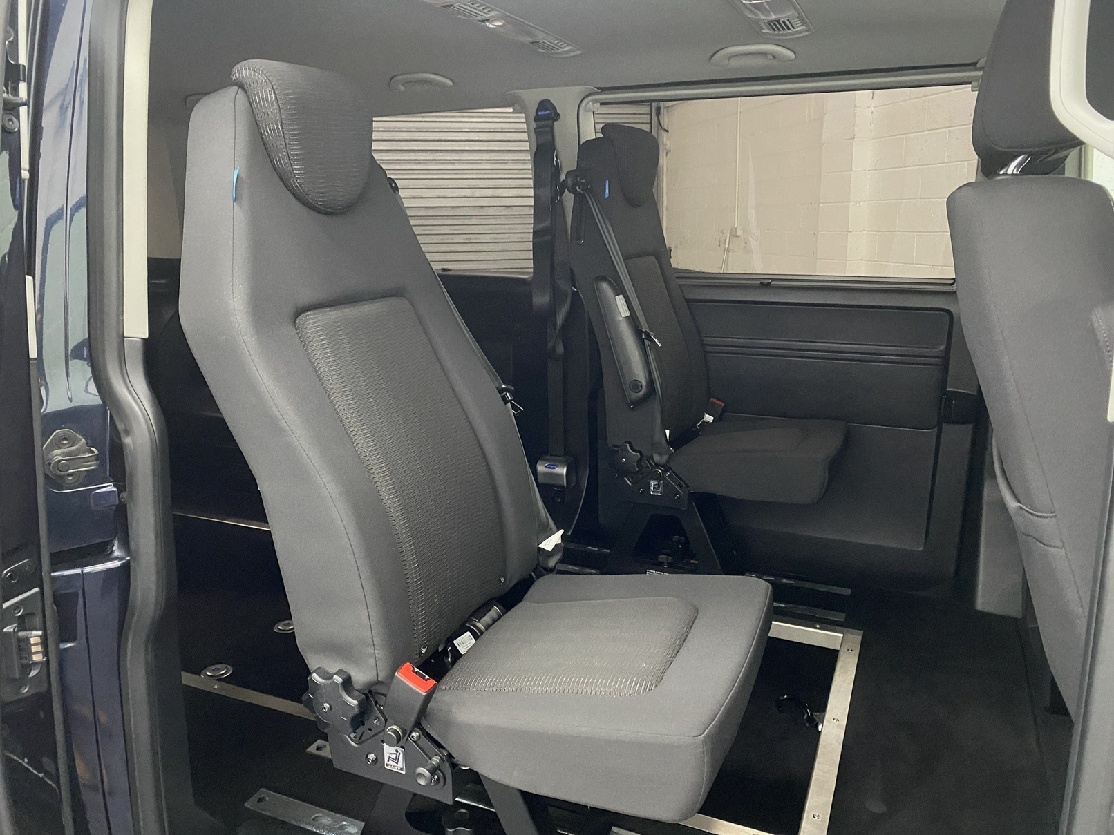 rear seats and lowered rear floor section in 2018 Volkswagen Transporter wheelchair accessible vehicle YJ68 BMU