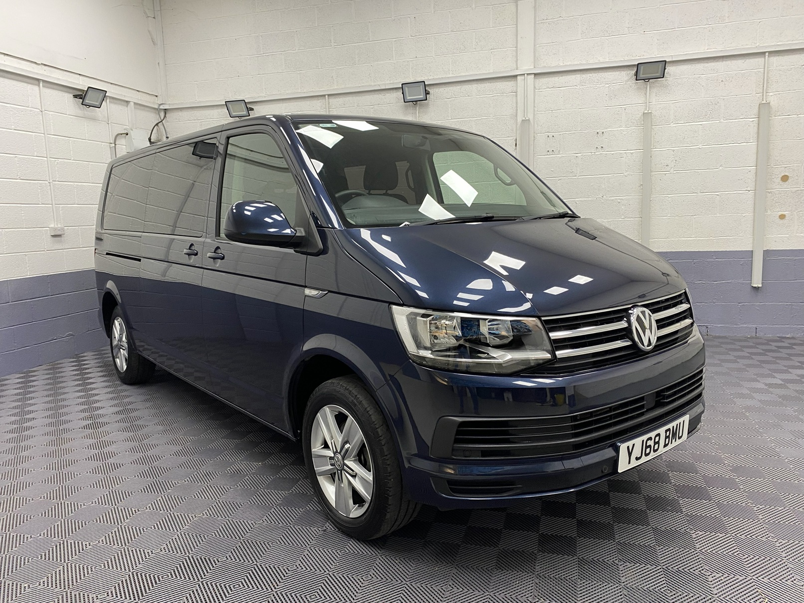 2018 Blue Volkswagen Transporter T6 LWB front three quarter view YJ68 BMU