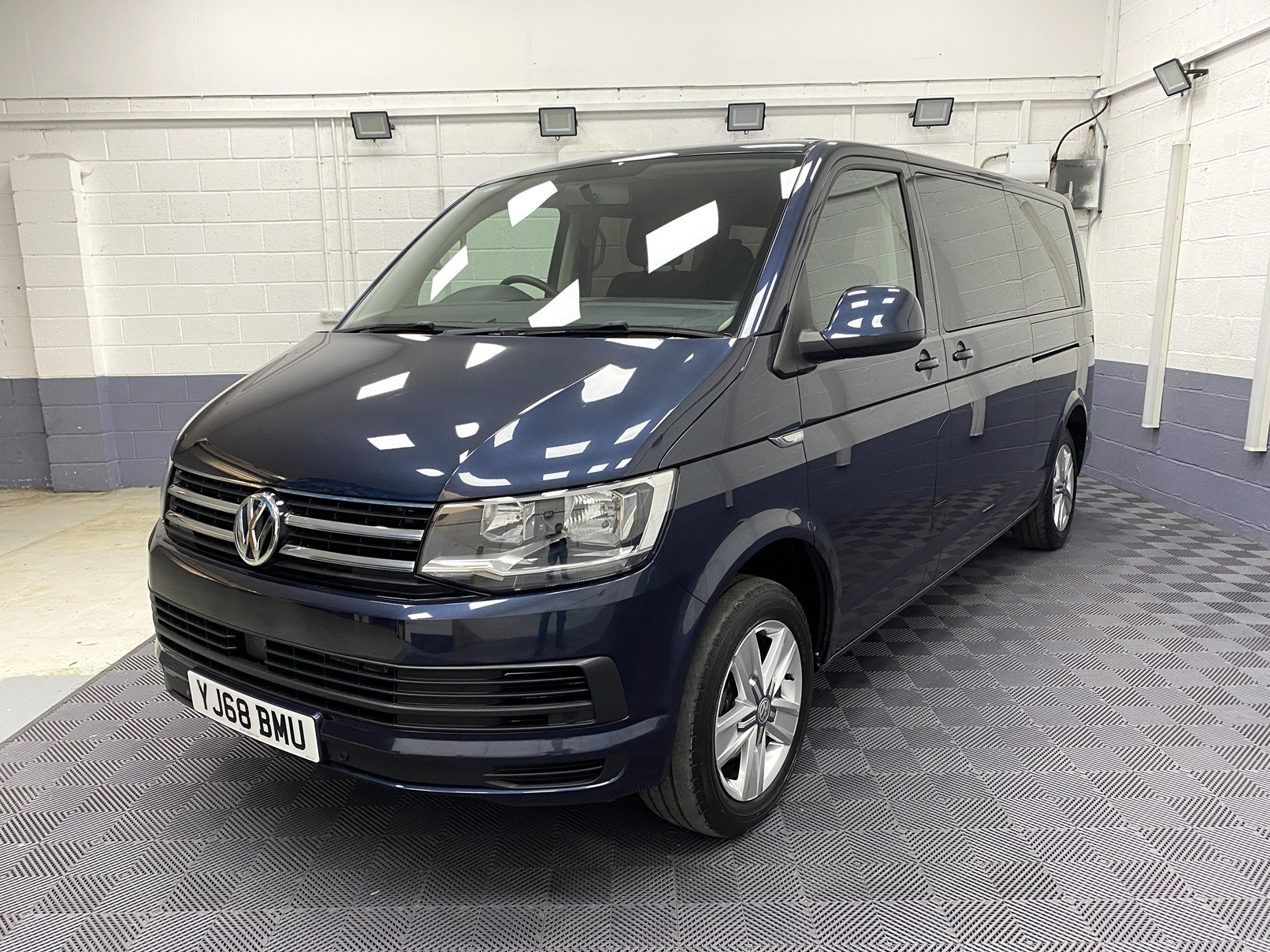 2018 Blue Volkswagen Transporter T6 LWB front three quarter view passenger side YJ68 BMU
