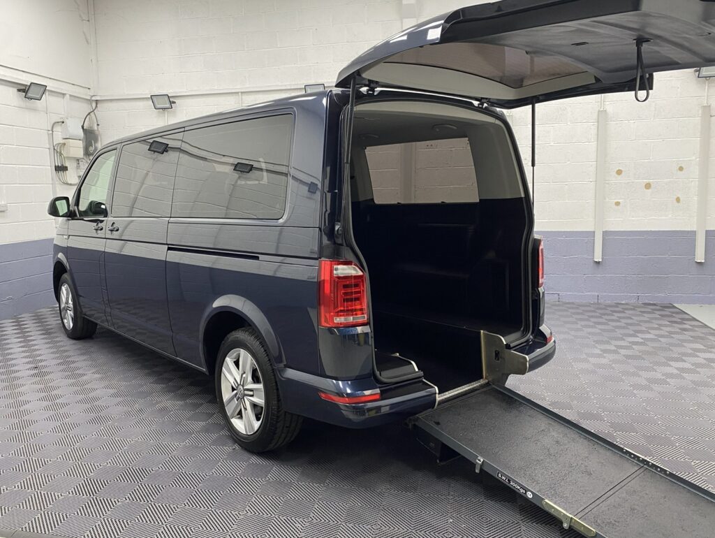 2018 Blue Volkswagen Transporter LWB wheelchair accessible vehicle with rear wheelchair ramp deployed YJ68 BMU