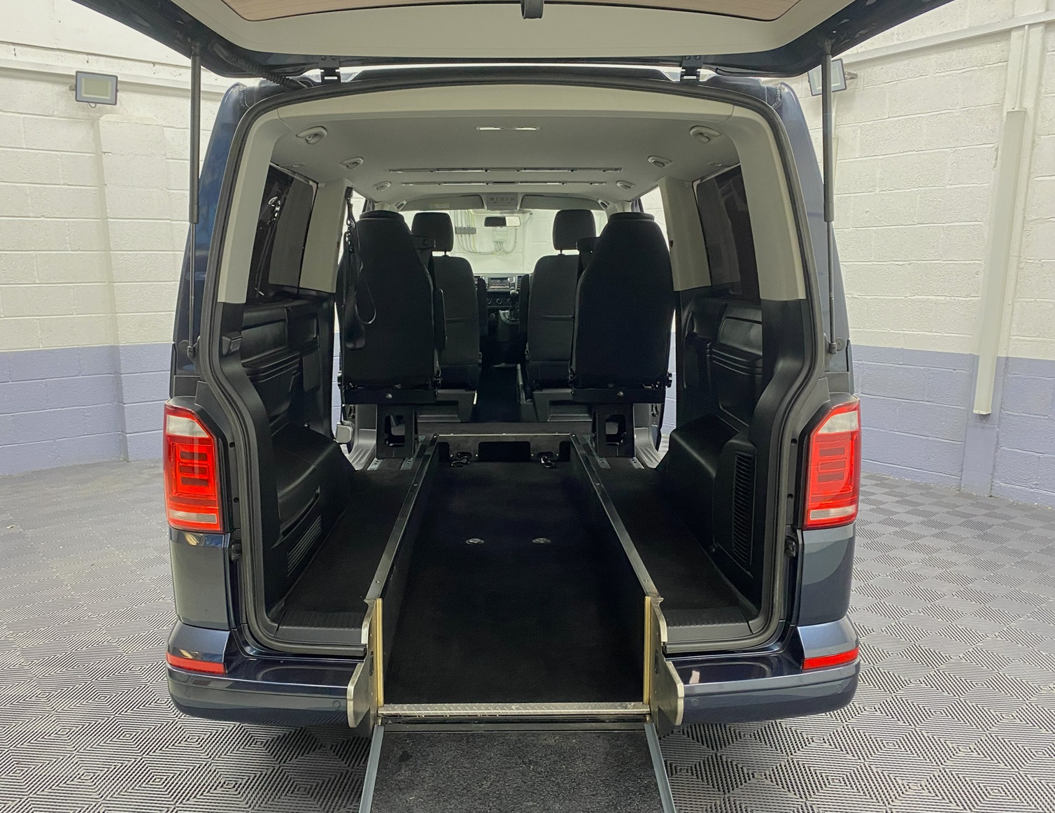 wheelchair area of a 2018 Blue Volkswagen Transporter LWB wheelchair accessible vehicle YJ68 BMU