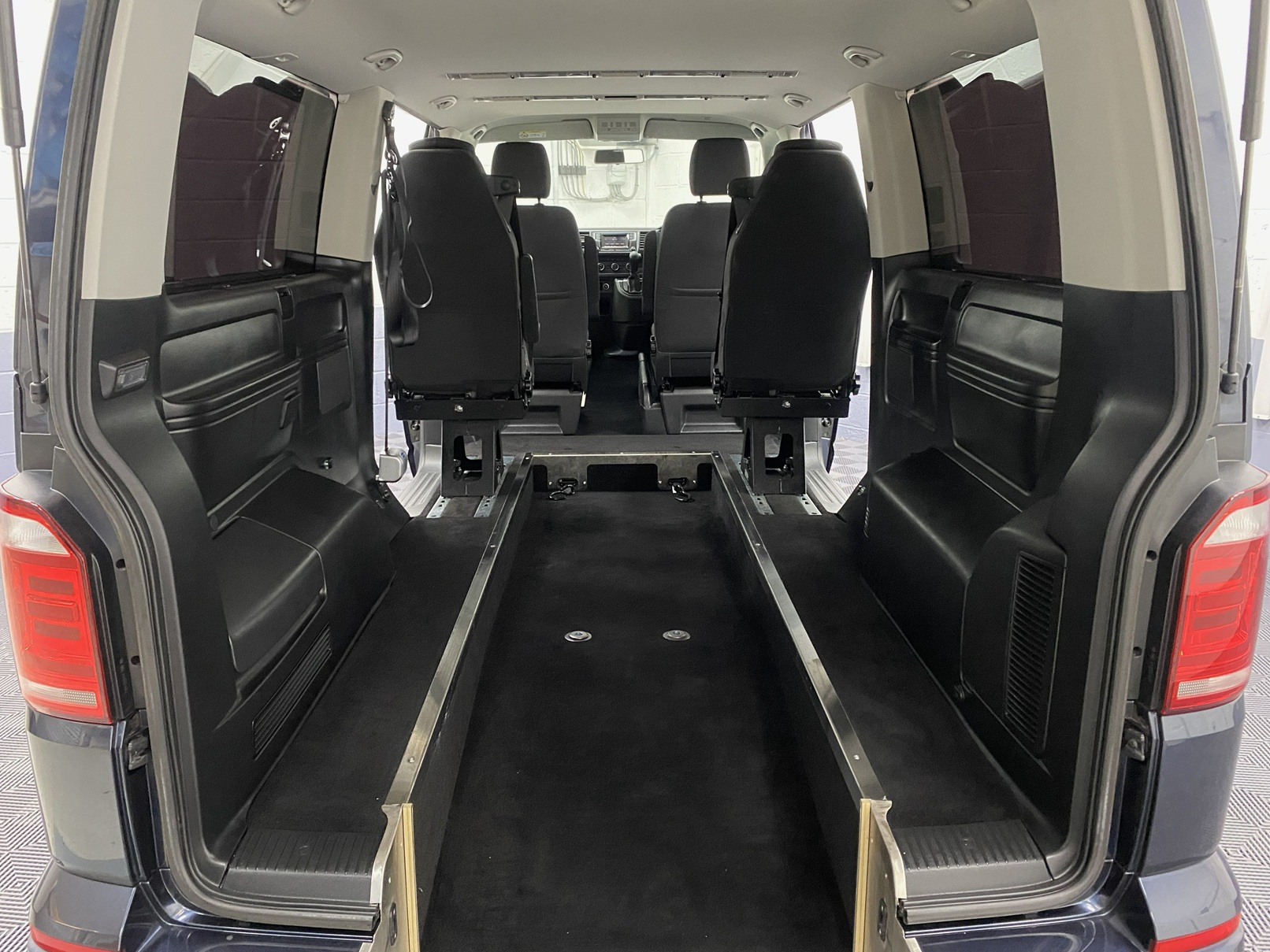 lowered rear floor section on a 2018 Blue Volkswagen Transporter LWB wheelchair accessible vehicle YJ68 BMU
