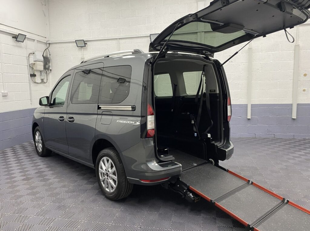 2023 Ford Tourneo Connect wheelchair accessible vehicle rear three quarter view with ramp deployed SD73NUV