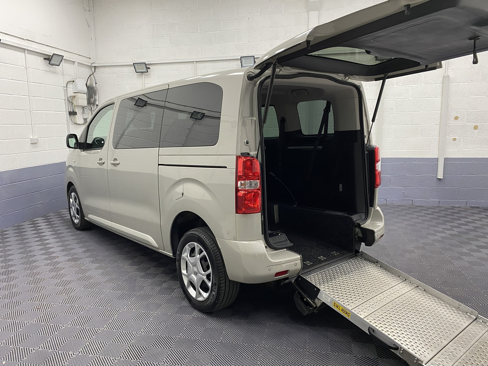 2022 Beige Citroen Space Tourer wheelchair accessible vehicle rear three quarter view with rear ramp deployed NK22 CVZ