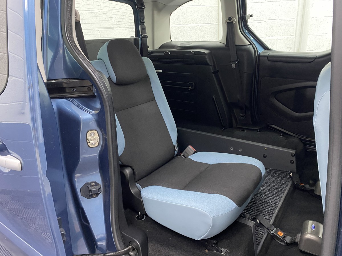 Citroen Berlingo WAV single rear seat in wheelchair area. WA64JEU
