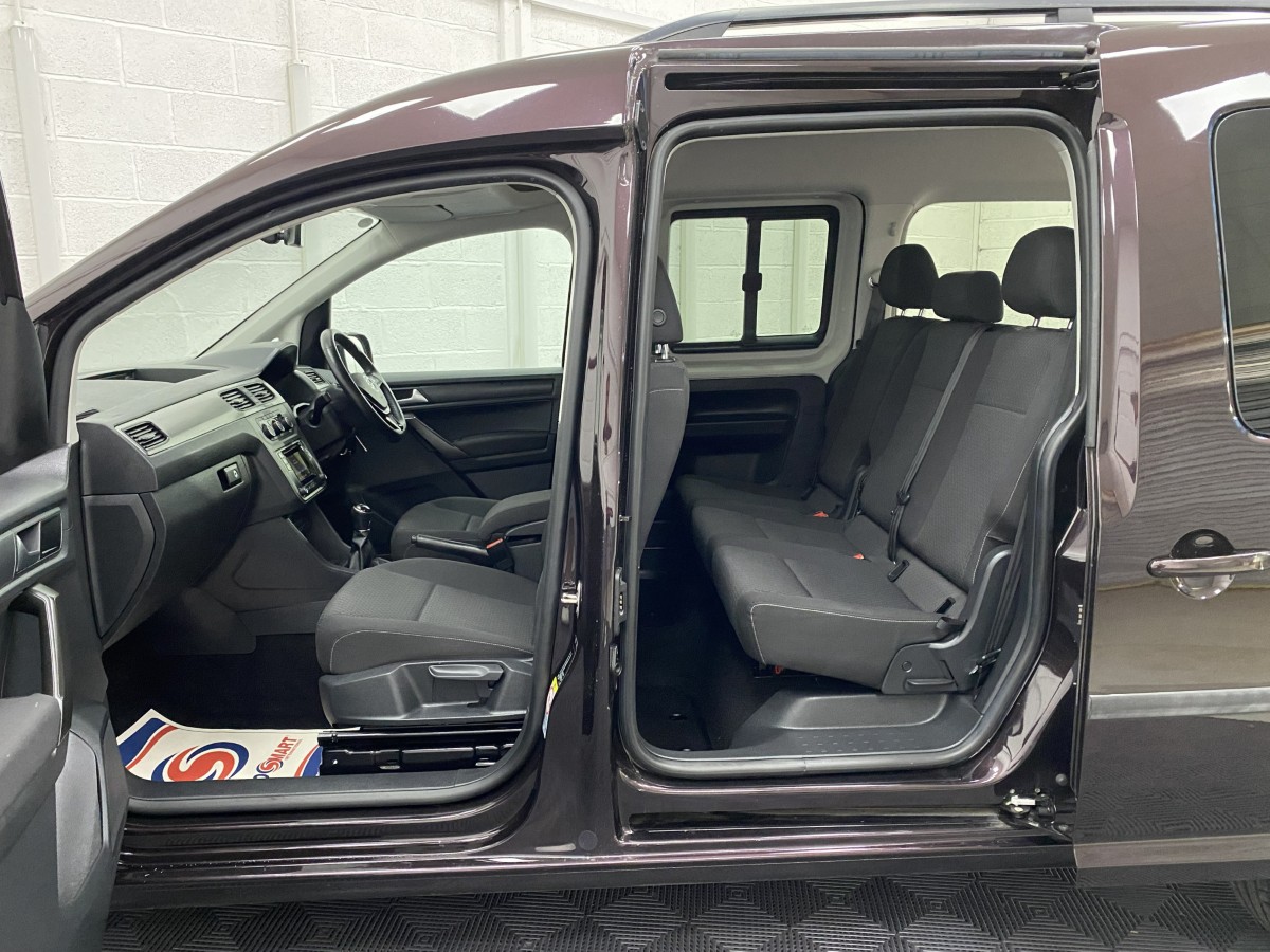 Volkswagen Caddy Maxi Wheelchair accessible vehicle interior view of both front and rear seats NK70ASO