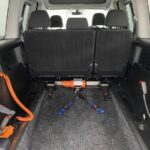 Volkswagen Caddy Maxi WAV rear wheelchair area and electric wheelchair winch and front restraining Straps NK70ASO