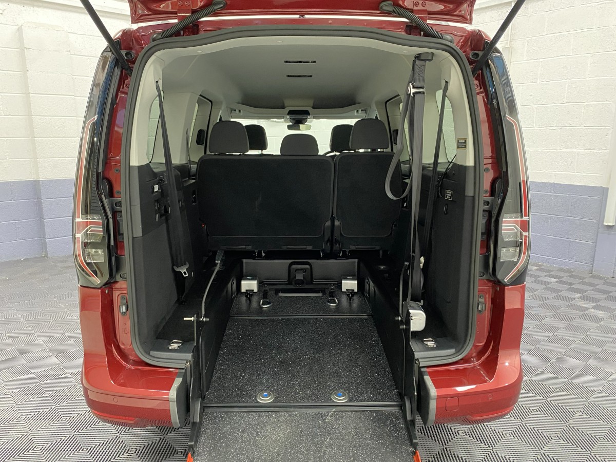 2023 Volkswagen Caddy Maxi WAV showing the rear wheelchair area and lowered floor section SJ23UDV