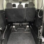 2023 Volkswagen Caddy Maxi WAV showing the rear wheelchair area and electric winch and front wheelchair restraints SJ23UDV
