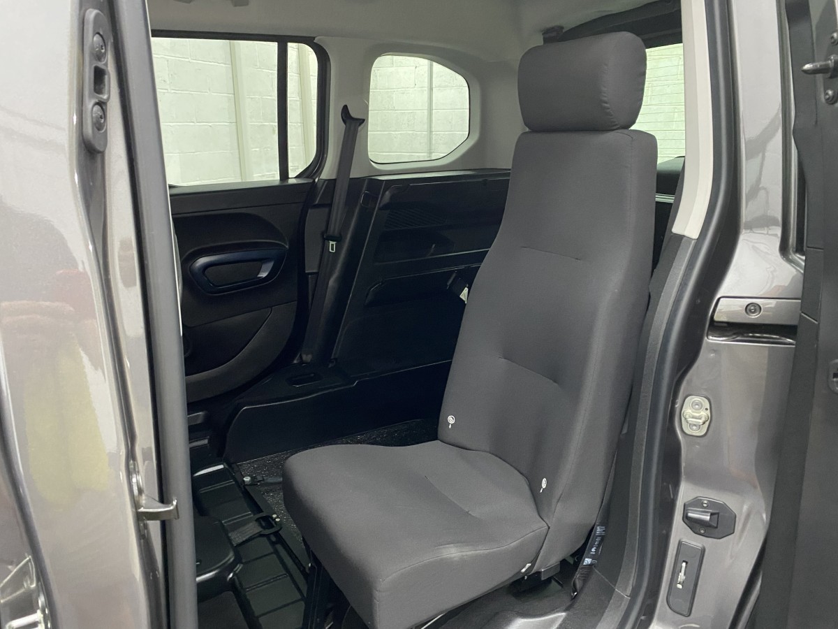 Single rear seat fitted to a Peugeot Rifter wheelchair accessible Vehicle SB21GJK