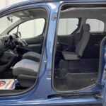 2014 Peugeot Partner wheelchair accessible vehicle side interior view showing both front and rear seats SF64FNS