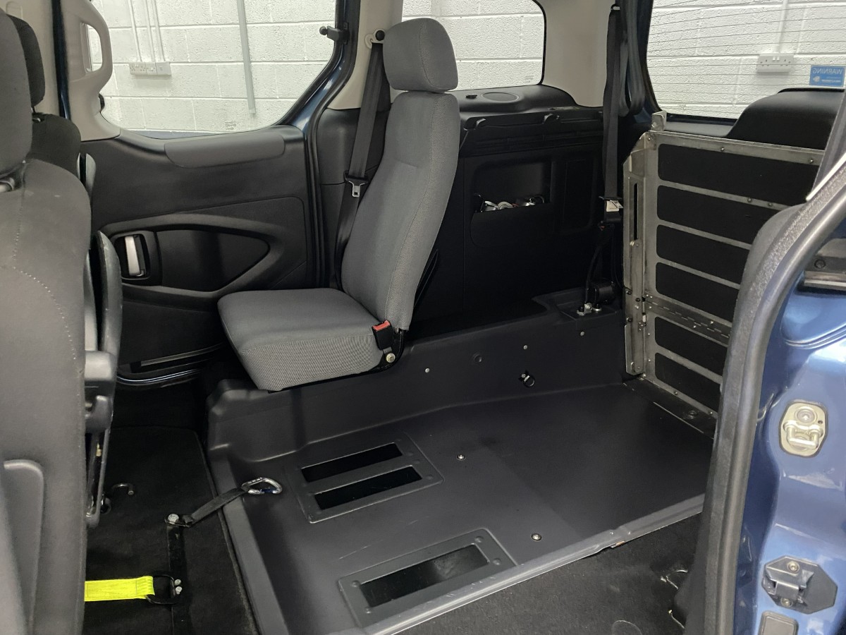 2014 Peugeot Partner wheelchair accessible vehicle rear wheelchair area via side door also showing lowered floor section SF64FNS