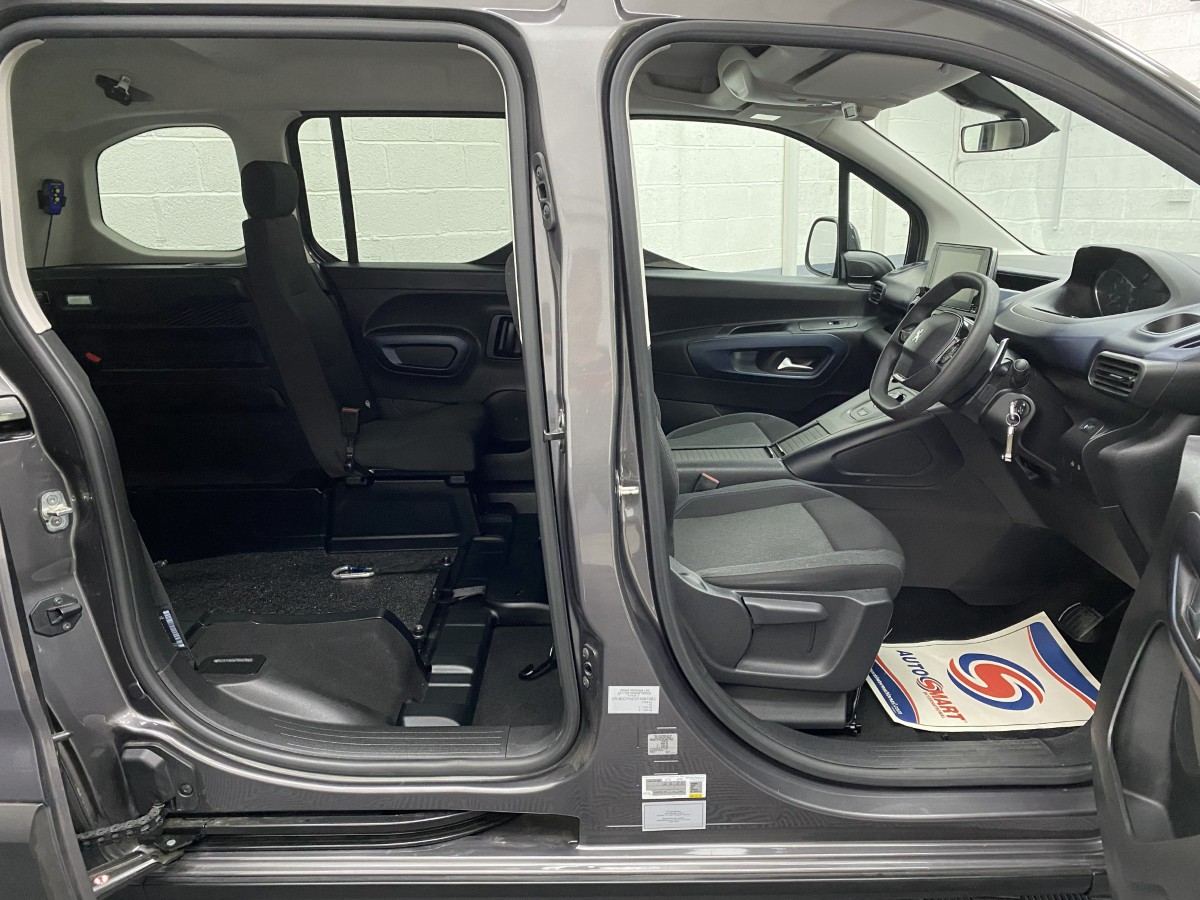 2023 Peugeot Rifter Automatic wheelchair accessible vehicle interior view of front seats and single rear seat. SB23XNG