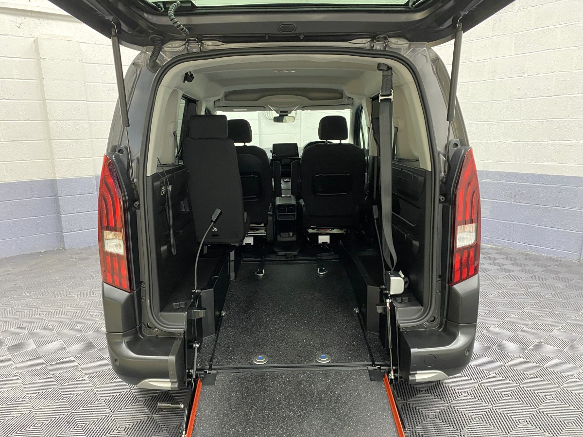 2023 Peugeot Rifter Automatic wheelchair accessible vehicle rear wheelchair area showing lowered rear floor section. SB23XNG