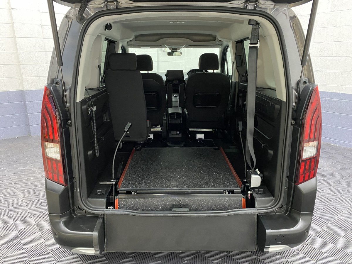 2023 Peugeot Rifter Automatic wheelchair accessible vehicle showing the rear ramp in the fold flat position. SB23XNG