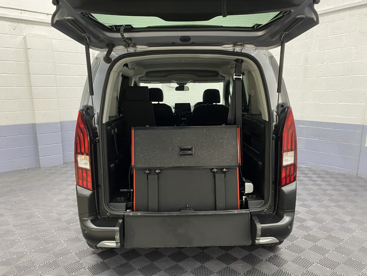 Peugeot Rifter wheelchair accessible vehicle showing the rear ramp in the stored position SA22YCE