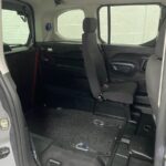 Peugeot Rifter wheelchair accessible vehicle showing wheelchair area, lowered rear floor section and single rear seat. SA22YCE