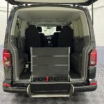 The rear wheelchair ramp in the stored position fitted to a Volkswagen Transporter T6.1 Automatic Wheelchair accessible vehicle YB21VXV