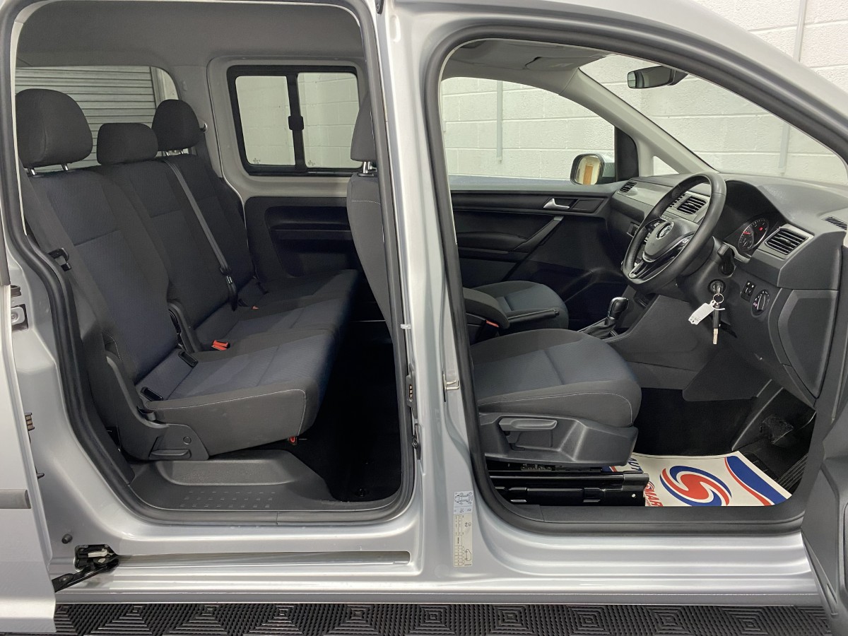 Volkswagen Caddy Maxi wheelchair accessible vehicle side view of interior of both front and rear seats SB21UOH
