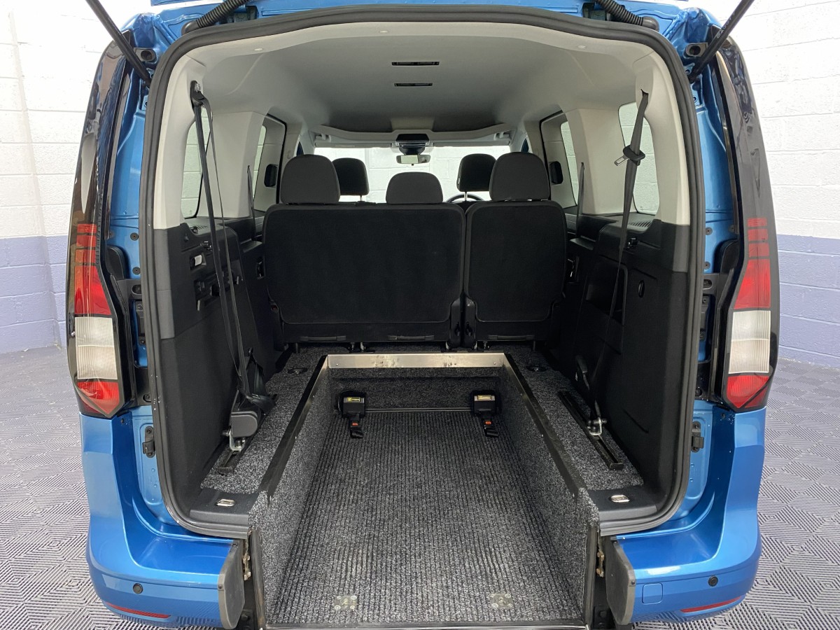 2022 Volkswagen Caddy Maxi Petrol wheelchair accessible vehicle rear wheelchair area showing extra lowered rear floor section NK72AUL