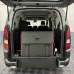 A Peugeot Rifter LWB Automatic Wheelchair Accessible Vehicle rear wheelchair ramp in the stored position SB24MJY