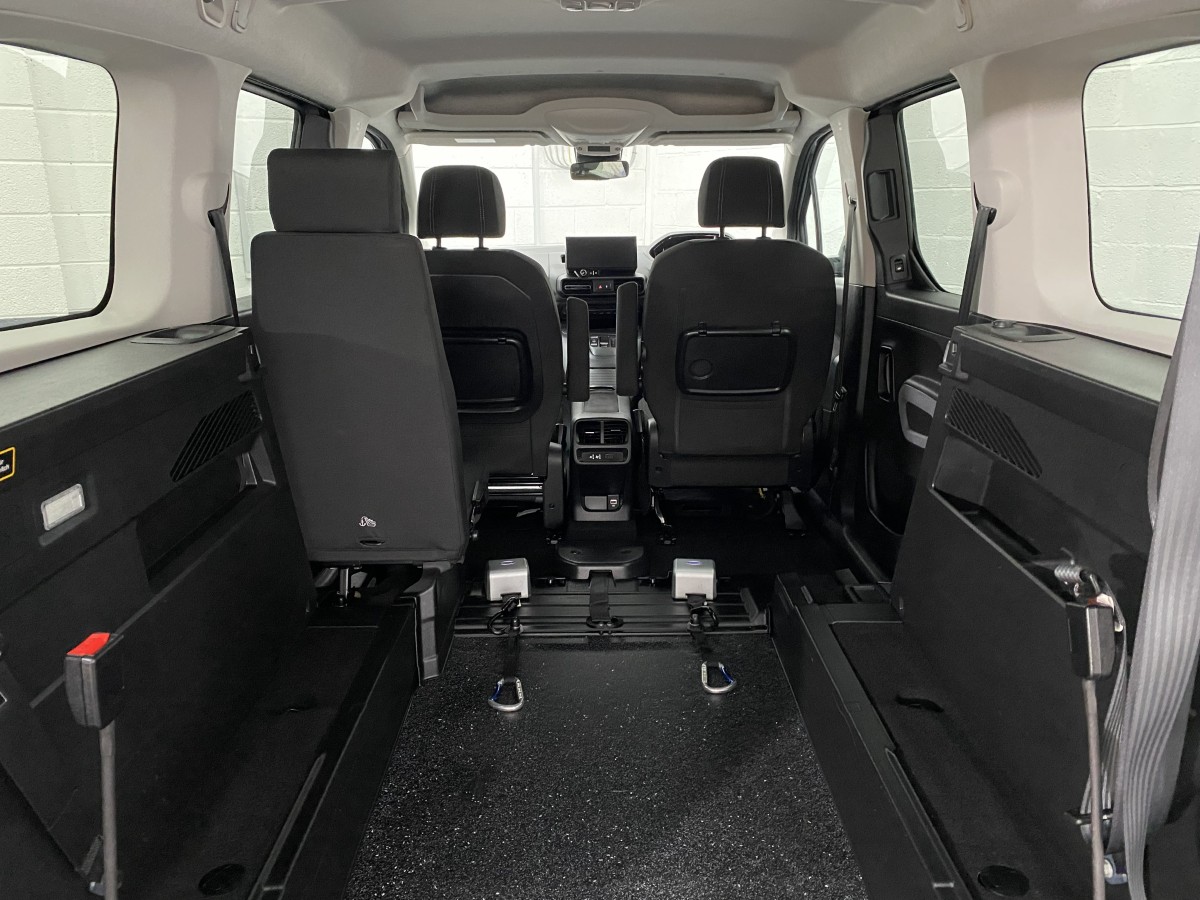 A Peugeot Rifter LWB Automatic Wheelchair Accessible Vehicle rear wheelchair area and front wheelchair restraints and winch SB24MJY