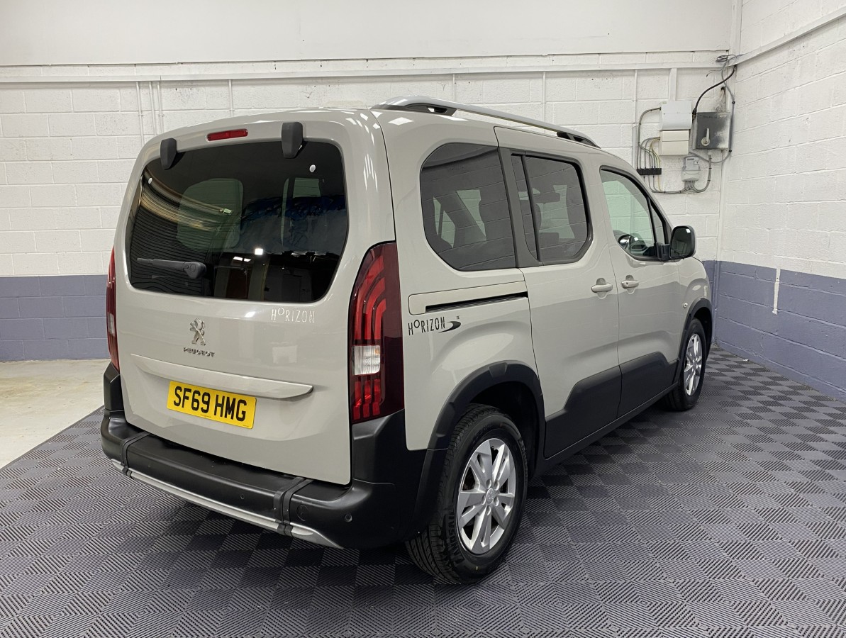 A Peugeot Rifter WAv rear three quarter view SF69HMG
