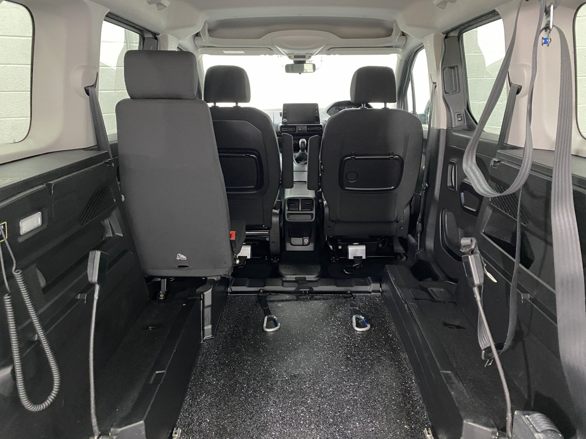 The rear wheelchair area and lowered floor on a Peugeot Rifter wheelchair accessible vehicle SF69HMG