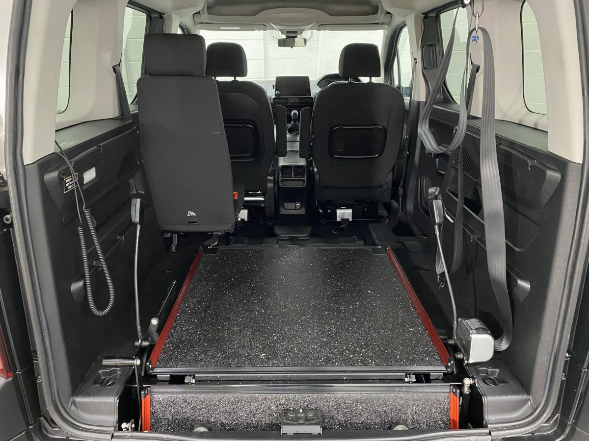 The rear wheelchair ramp in the fold flat position fitted to a Peugeot Rifter WAV SF69HMG